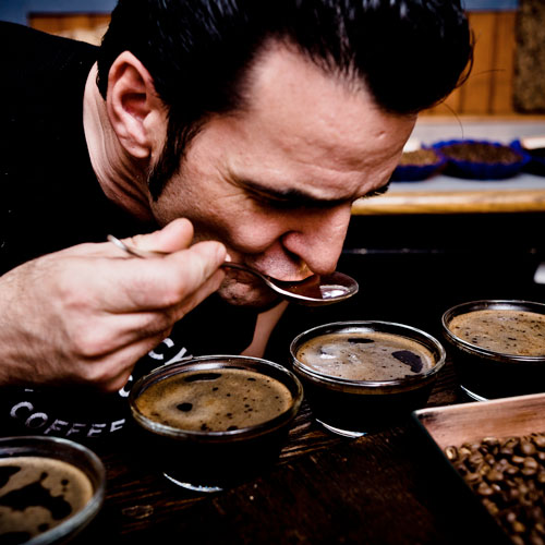 Master Roaster performing a Cupping for Quality Control